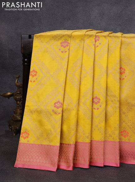Banarasi katan silk saree yellow and peach pink with allover zari weaves and zari woven border