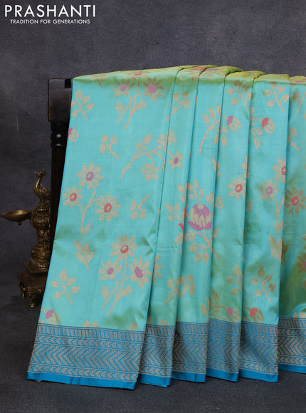 Banarasi katan silk saree dual shade of teal and cs blue with allover zari woven floral weaves and zari woven border
