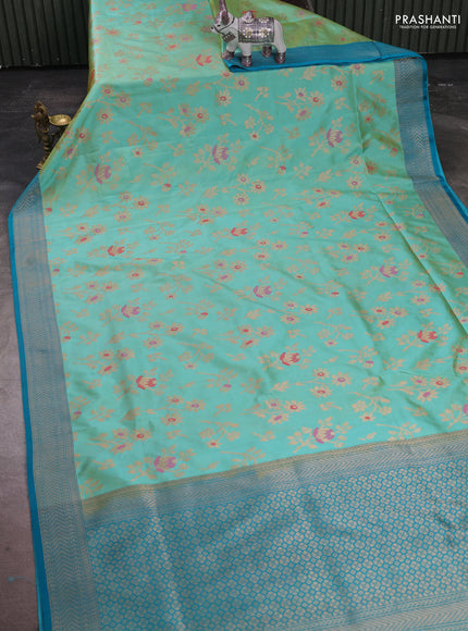 Banarasi katan silk saree dual shade of teal and cs blue with allover zari woven floral weaves and zari woven border
