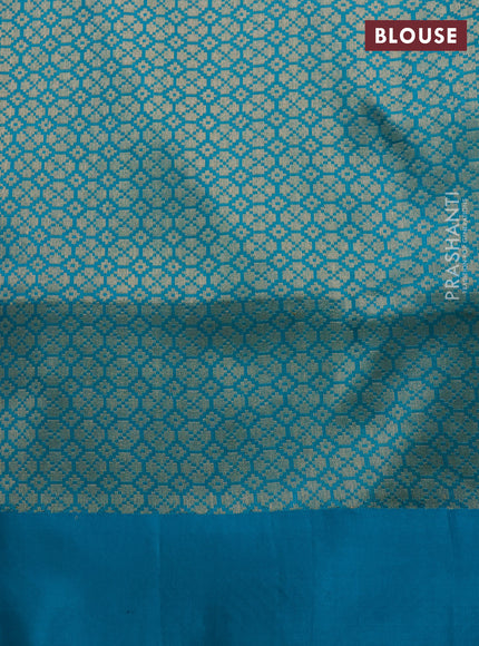 Banarasi katan silk saree dual shade of teal and cs blue with allover zari woven floral weaves and zari woven border