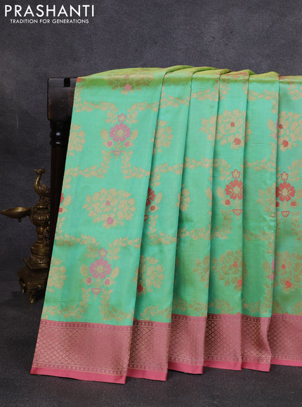 Banarasi katan silk saree teal green and peach pink with allover zari woven floral weaves and zari woven border
