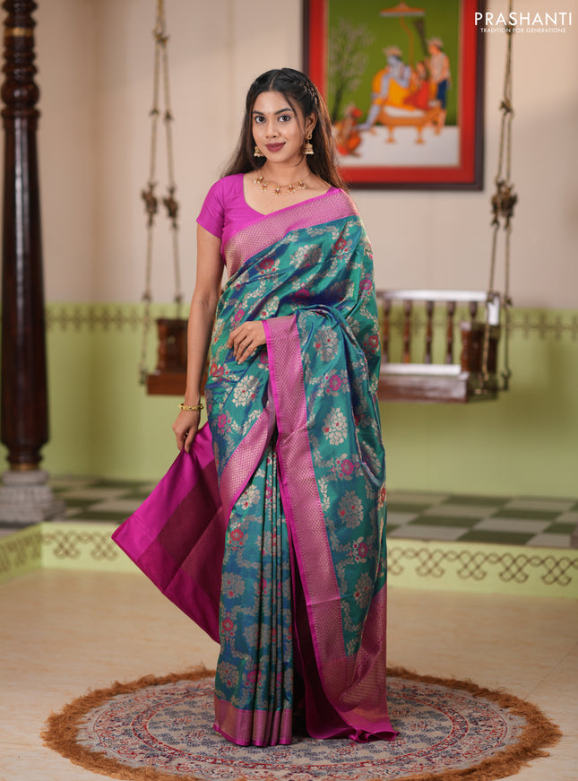 Banarasi katan silk saree dual shade of greenish blue and magenta pink with allover zari woven floral weaves and zari woven border