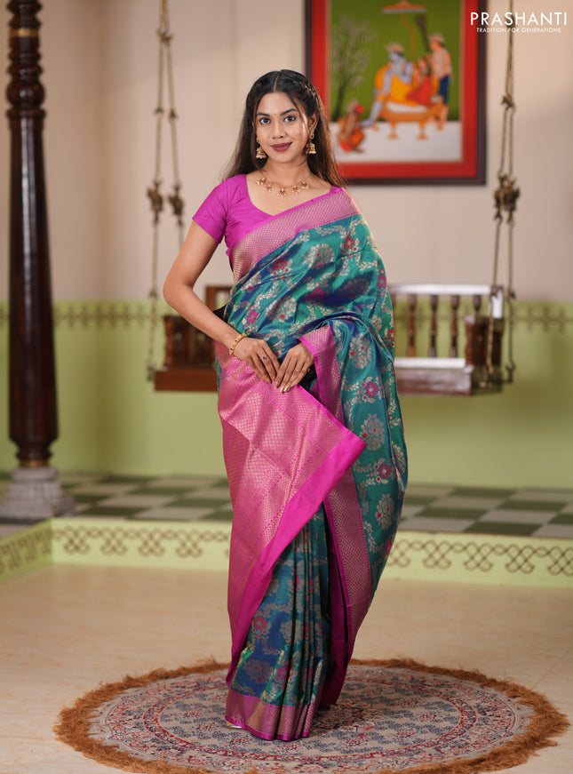 Banarasi katan silk saree dual shade of greenish blue and magenta pink with allover zari woven floral weaves and zari woven border