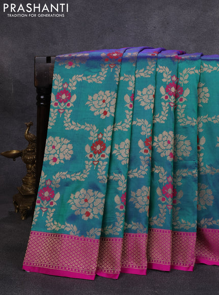 Banarasi katan silk saree dual shade of greenish blue and magenta pink with allover zari woven floral weaves and zari woven border