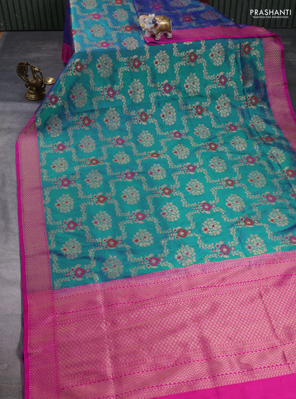 Banarasi katan silk saree dual shade of greenish blue and magenta pink with allover zari woven floral weaves and zari woven border