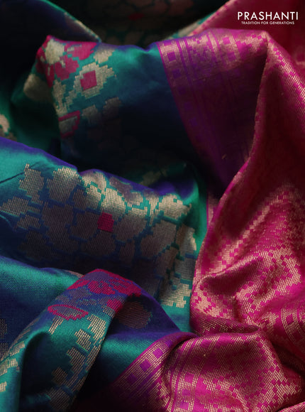Banarasi katan silk saree dual shade of greenish blue and magenta pink with allover zari woven floral weaves and zari woven border