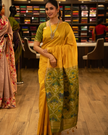 Semi dupion saree mustard yellow and light green with zari woven buttas and zari woven border