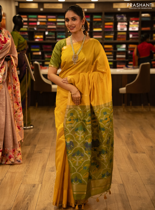 Semi dupion saree mustard yellow and light green with zari woven buttas and zari woven border