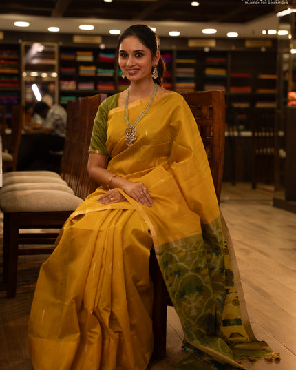 Semi dupion saree mustard yellow and light green with zari woven buttas and zari woven border