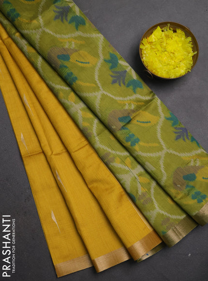 Semi dupion saree mustard yellow and light green with zari woven buttas and zari woven border
