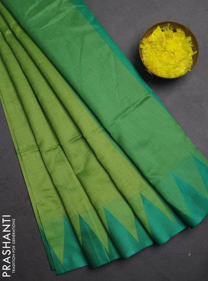 Semi dupion saree light green and green with allover thread weaves and temple design thread woven border