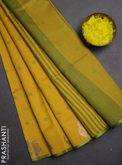 Semi dupion saree mustard yellow and light green with allover thread woven bandhani buttas and zari woven border