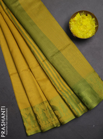 Semi dupion saree mustard yellow and light green with allover thread weaves and thread woven border