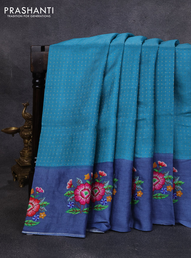 Pure tussar silk saree teal green and blue with allover zari woven buttas and floral embroidery butta border