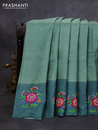 Pure tussar silk saree pastel green and peacock green with allover zari woven buttas and floral embroidery butta border
