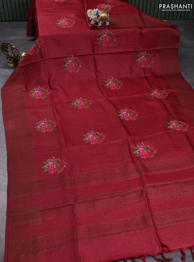 Pure tussar silk saree maroon with floral embroidery buttas and zari woven checked border