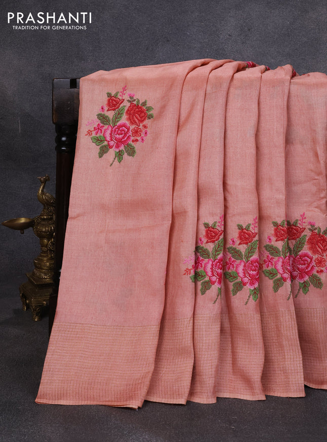 Pure tussar silk saree pastel peach with floral embroidery buttas and zari woven checked border