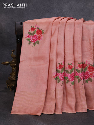 Pure tussar silk saree pastel peach with floral embroidery buttas and zari woven checked border