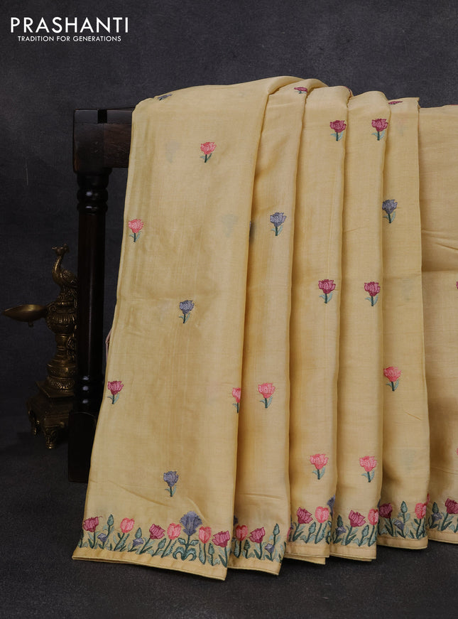 Pure tussar silk saree pale yellow with embroidery buttas and floral embroidery border