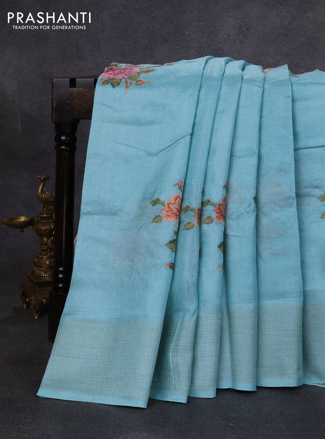 Pure tussar silk saree light blue with floral embroidery buttas and checked border