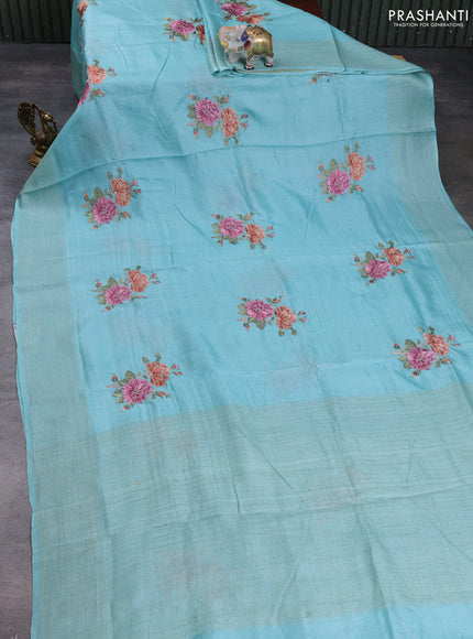Pure tussar silk saree light blue with floral embroidery buttas and checked border