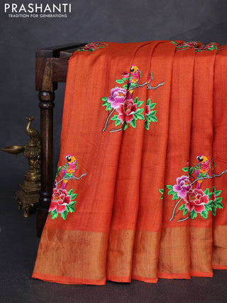 Pure tussar silk saree orange with floral embroidery buttas and zari woven border