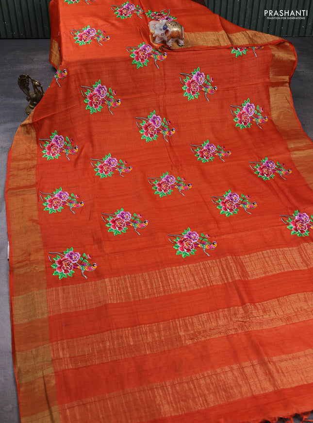 Pure tussar silk saree orange with floral embroidery buttas and zari woven border