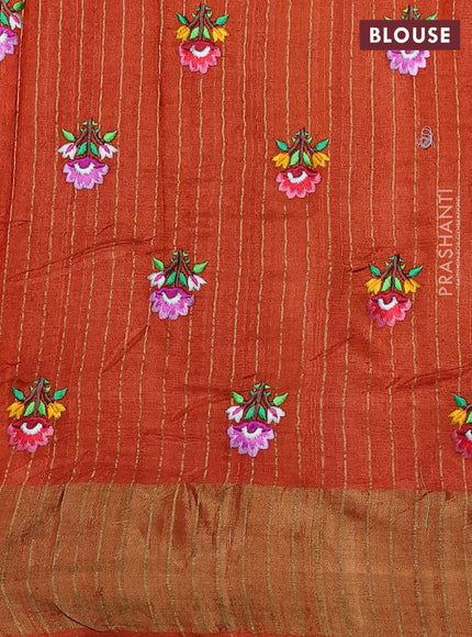 Pure tussar silk saree orange with floral embroidery buttas and zari woven border