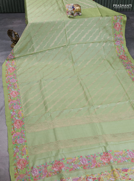Pure tussar silk saree pastel green with allover zari weaves and embroidery border