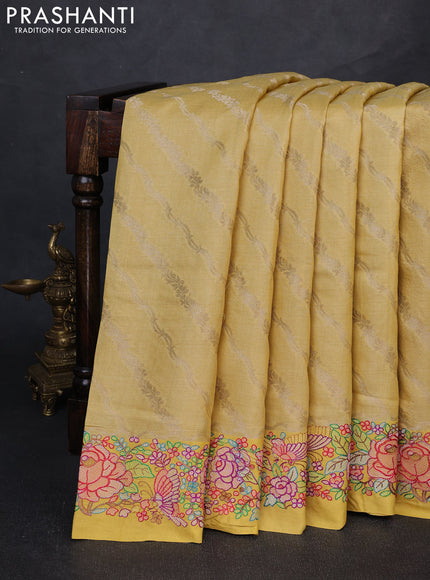 Pure tussar silk saree yellow with allover zari weaves and embroidery border