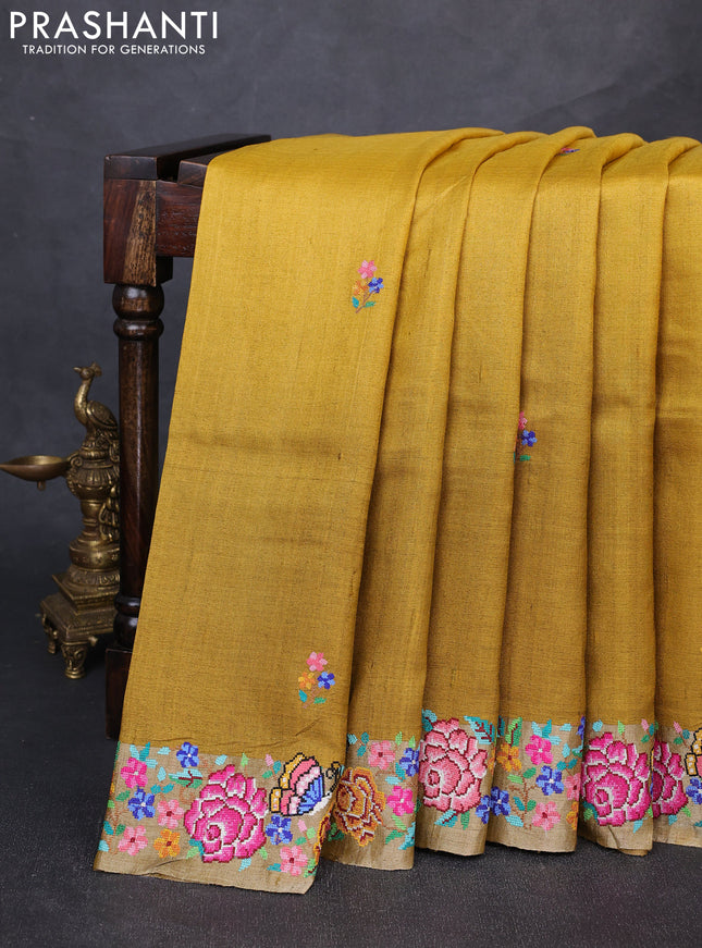 Pure tussar silk saree yellow and mustard yellow with floral thread woven buttas and zari woven embroidery border