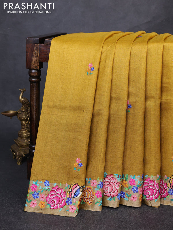 Pure tussar silk saree yellow and mustard yellow with floral thread woven buttas and zari woven embroidery border