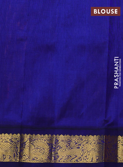 Silk cotton saree peach orange and navy blue with plain body and zari woven korvai border