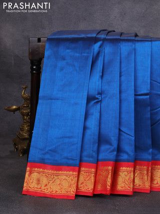 Silk cotton saree peacock blue and red with plain body and zari woven korvai border
