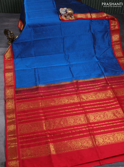 Silk cotton saree peacock blue and red with plain body and zari woven korvai border