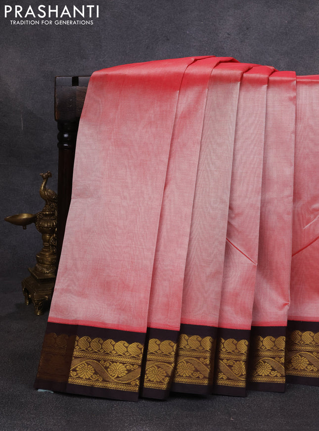 Silk cotton saree peach orange and deep maroon with plain body and zari woven korvai border