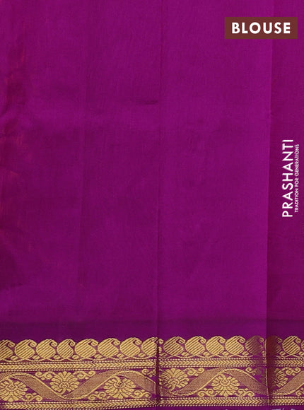 Silk cotton saree orange and purple with plain body and zari woven korvai border