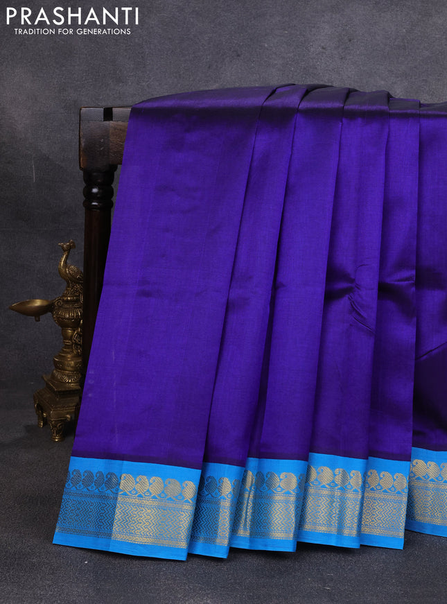 Silk cotton saree royal blue and cs blue with plain body and zari woven korvai border
