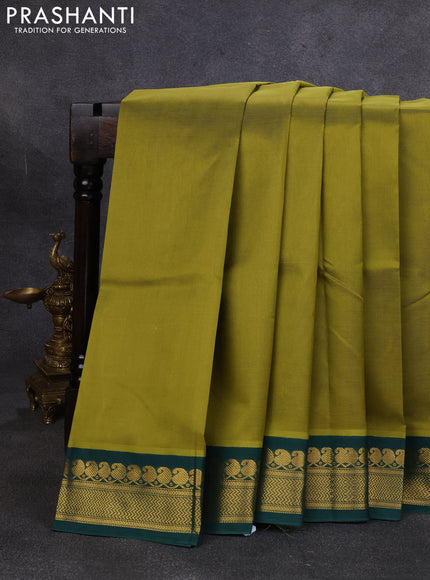 Silk cotton saree mehendi green and bottle green with plain body and zari woven korvai border