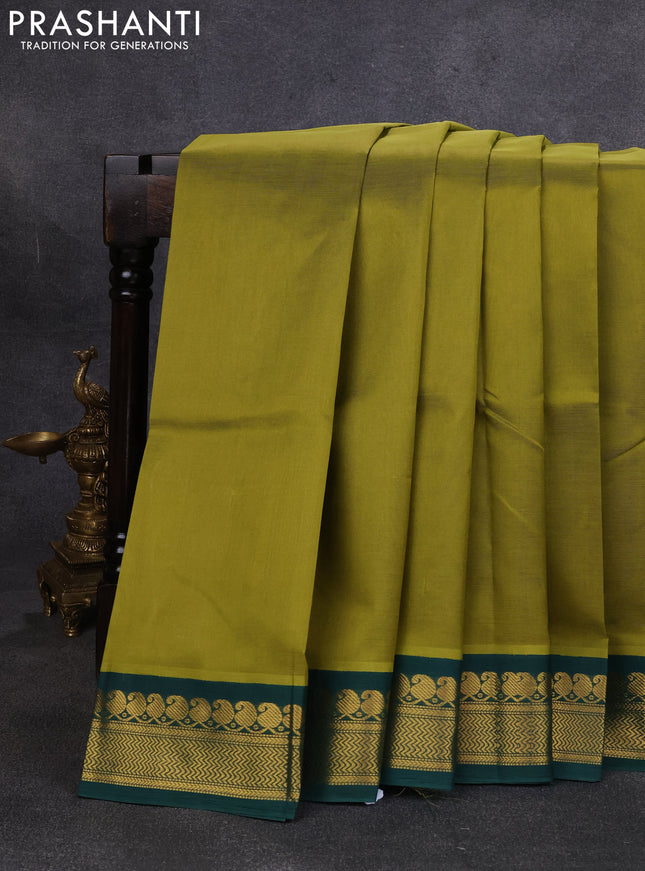 Silk cotton saree mehendi green and bottle green with plain body and zari woven korvai border
