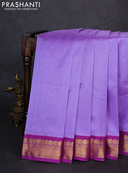 Silk cotton saree lavender and purple with plain body and zari woven korvai border