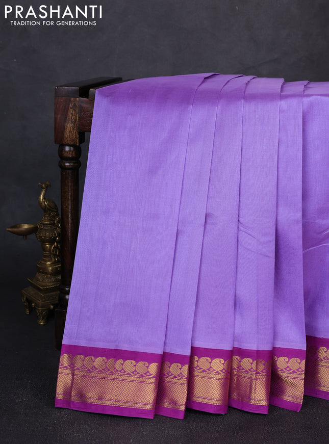Silk cotton saree lavender and purple with plain body and zari woven korvai border