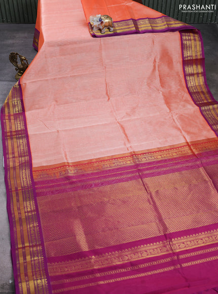 Silk cotton saree peach orange and purple with plain body and zari woven korvai border