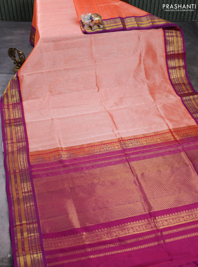 Silk cotton saree peach orange and purple with plain body and zari woven korvai border