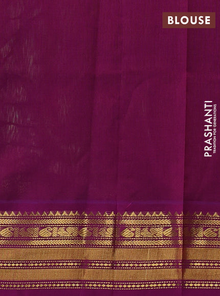 Silk cotton saree pista green and purple with plain body and zari woven korvai border