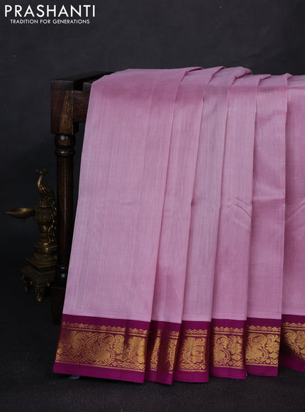 Silk cotton saree mild lavender and purple with plain body and paisley butta zari woven korvai border