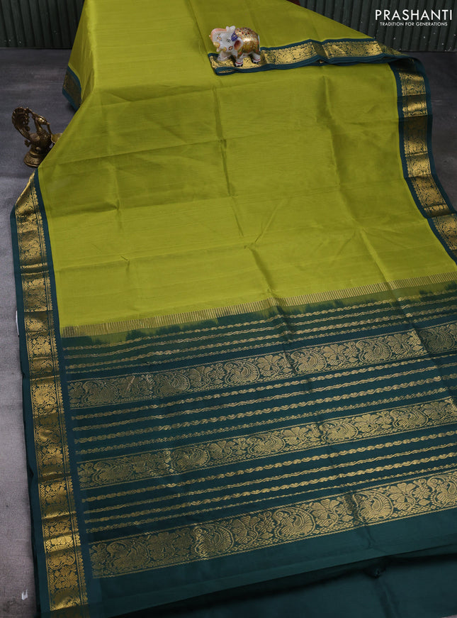 Silk cotton saree mehendi green and bottle green with plain body and paisley butta zari woven korvai border