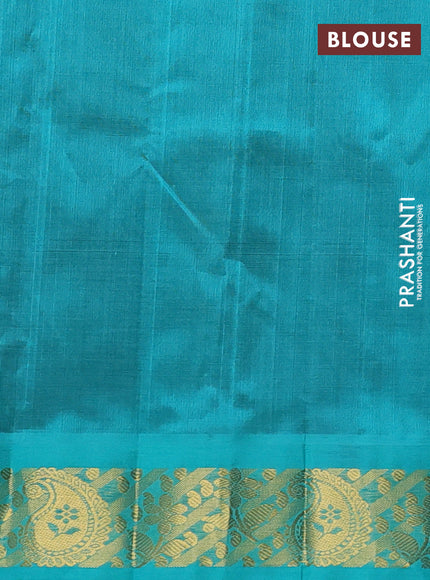 Silk cotton saree deep wine and teal green with plain body and paisley butta zari woven korvai border
