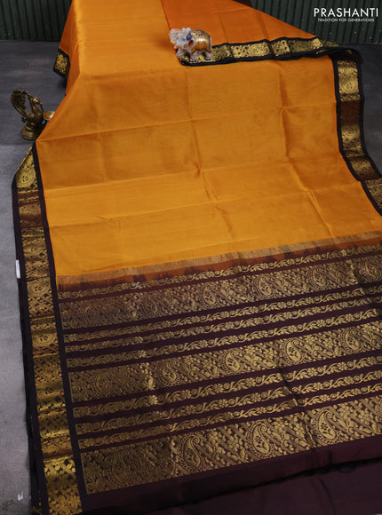 Silk cotton saree mustard yellow and coffee brown with plain body and paisley butta zari woven korvai border