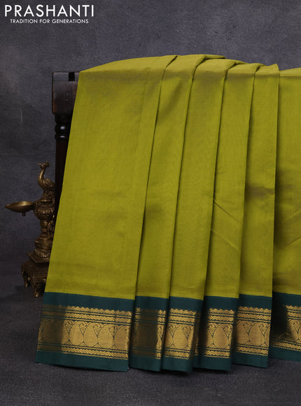 Silk cotton saree mehendi green and bottle green with plain body and paisley zari woven korvai border